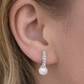 Pandora oorbellen met gekweekte parels en zirkonia, gemaakt van 925 sterling zilver.